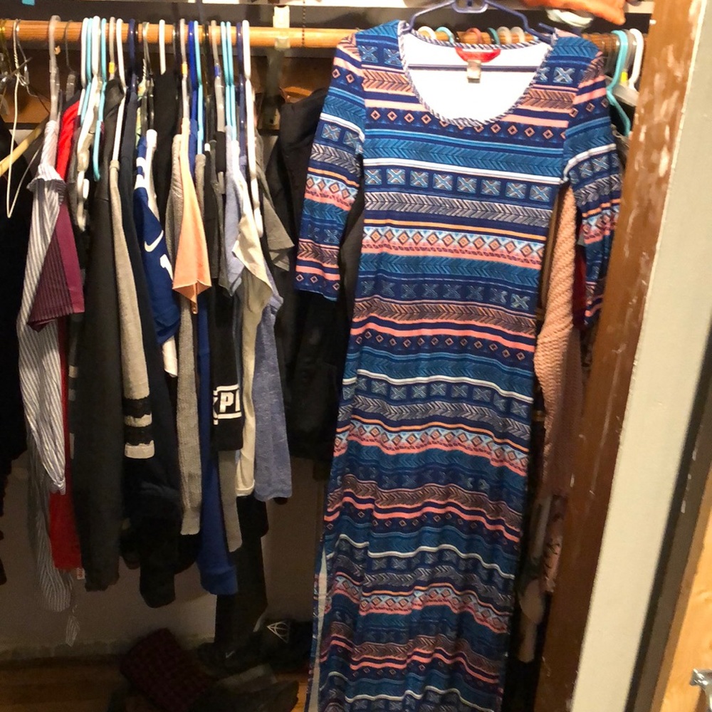 New long dress. With elbow length sleeves.
